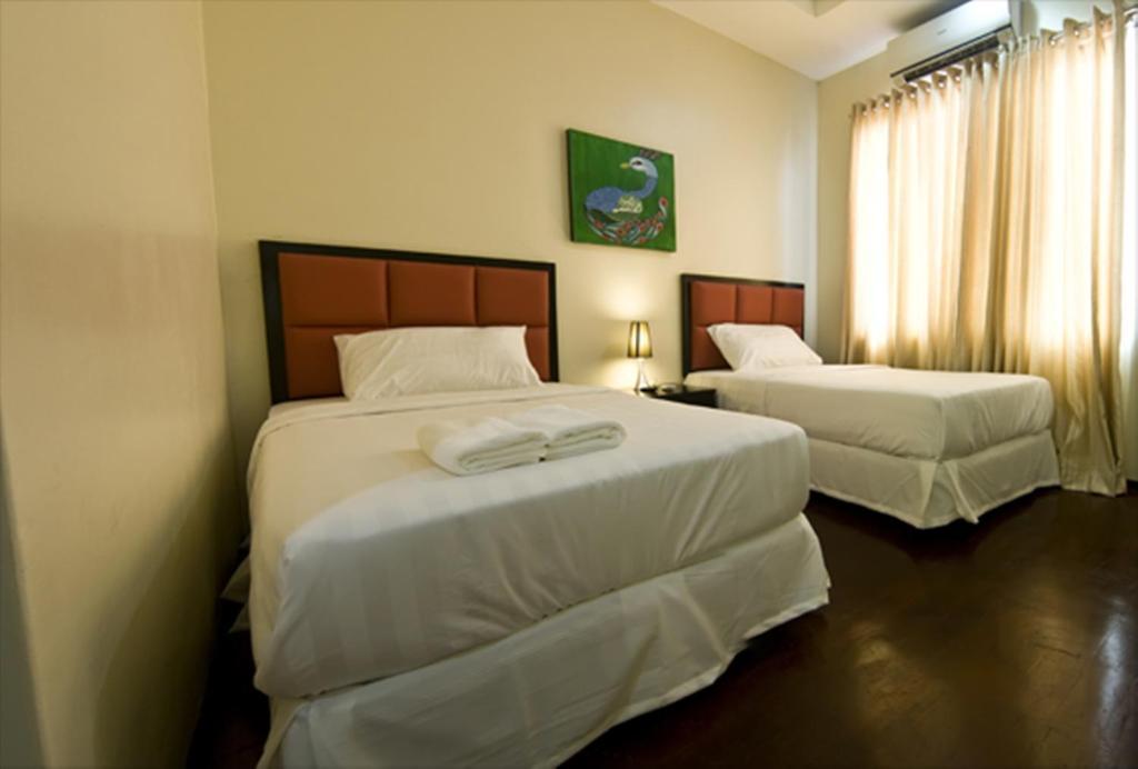 Arabelle Suites Tagbilaran Chambre photo